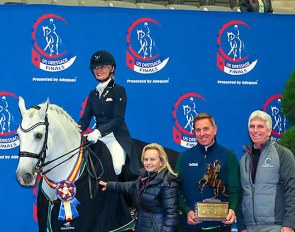 Janne Rumbough and Armas Zumbel are presented with the Calaveras County Perpetual Trophy for the Grand Prix Adult Amateur Freestyle Championship :: Photo © Susan J. Stickle