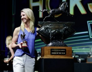 Laura Graves receives the trophy for Verdades' title as 2018 USEF International Horse of the Year at the Pegasus Awards Dinner