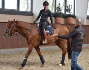 Agnete Kirk Thinggaard on Blue Hors Veneziano with coach Lars Petersen by her side :: Photo © Ridehesten
