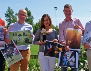 The jury holding seven of the best photos for the 2019 Silver Camera Award