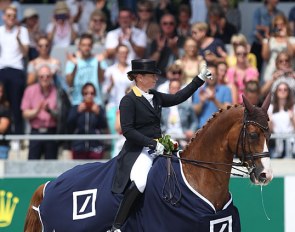 Isabell Werth puts her thumb up to crowd in the prize giving ceremony at the 2019 CDIO Aachen :: Photo © Astrid Appels