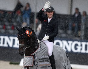 Frederic Wandres and Zucchero in a rainy lap of honour at the 2019 World Young Horse Championships :: Photo © Astrid Appels