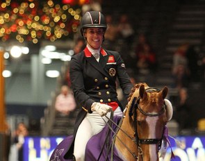 Charlotte Dujardin in her lap of honour on her rising GP horse Gio at the 2019 CDI-W London :: Photo © Astrid Appels