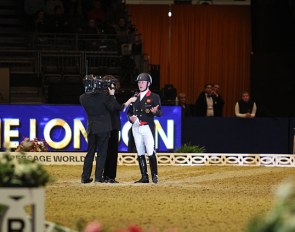 Richard Davison getting interviewed after riding the new Short Grand Prix test at the 2019 CDI-W London :: Photo © Astrid Appels