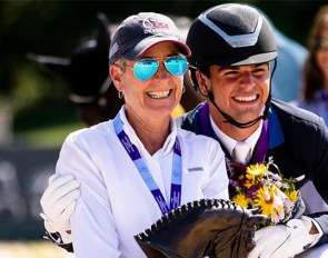 Roberta Williams, here with young rider Christian Simonson and the Fiona Baan trophy at the 2021 North American Youth Championships :: Photo © USEF