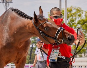 Japan's Grade IV athlete Katsuji Takashima and his horse Huzette pose for a selfie after the Para Dressage horse inspection at the Tokyo 2020 Paralympic Games (FEI/Liz Gregg) 