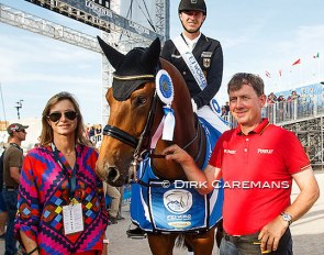 Gonnelien and Sven Rothenberger with their son Sönke on Cosmo at the 2018 World Equestrian Games :: Photo © Dirk Caremans