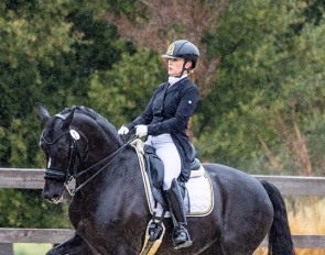 Rebecca Rigdon and Heide Spirit win the Grand Prix at the rainy 2023 CDI Temecula in California :: Photo © Terri Miller