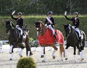 The senior medal winners: Andreas Helgstrand (bronze), Nanna Skodborg Merrald (gold), Carina Cassoe Kruth (silver) at the 2023 Danish Championships :: Photos © Ridehesten