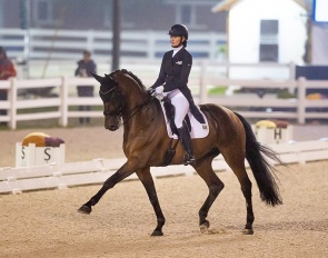 Yvonne Losos de Muniz and Aquamarijn competing under the lights to win the Grand Prix for Kur at the 2023 CDI-W Devon :: Photo ©  Olivia Airhart/Phelps Media Group