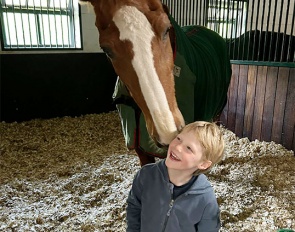 A 29-year old Mistral Hojris, aka Alf, with Laura's second son Wilfred at home in the U.K.