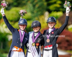 Anniek van Dulst, Lana-Pinou Baumgurtel and Anna Teibel Raben on the individual test podium at the 2025 European Young Riders Championships :: Photo © Stefan Lafrentz