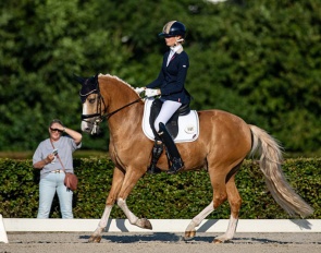 Trainr Nicole Werner watching student Isabella Karajkovic on First Hummer at the 2025 Hippiade