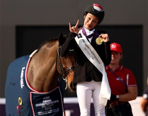 Laurentia Tan of Singapore celebrates winning gold during the Para Dressage individual championship at the Thai Polo Club on November 26, 2025 in Pattaya (THA) :: Photo © FEI/Yong Teck Lim