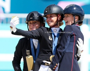 The three 2024 Olympic individual medal winners taking a selfie on the podium :: Photo © Astrid Appels