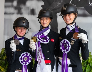 The Kur podium at the 2026 European Junior Riders Championships with Kohoutek, Asmussen, and Wagner showing their medals :: Photos © Lukasz Kowalski
