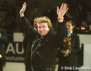 Sjef Janssen raises his hands in victory. In 2000 he was proclaimed Trainer of the Year by the International Dressage Trainers Club :: Photo © Dirk Caremans