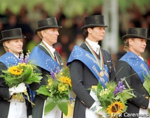 The German Team wins gold: Nadine Capellmann, Heike Kemmer, Ulla Salzgeber, Isabell Werth