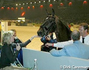 An injured Anky van Grunsven in crutches salutes TCN Partout at the 2003 Zwolle Stallion Show :: Photo © Dirk Caremans