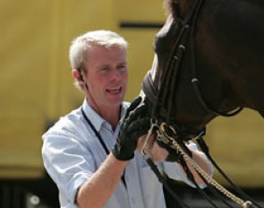 Jan Brink cuddling with Briar before he starts a schooling session