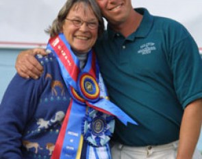 Scot Hassler hugs his employer Jane McElree of Hilltop Farm after winning trophies and ribbons at the 2005 Devon Breed Show :: Photo © Mary Phelps