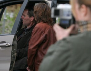 Victor Kerkhof has the music playing on Wayne's car system, wife Debra watches while groom Lieke videotapes the ride