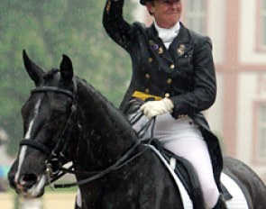 Rain couldn't dampen Kyra Kyrklund's spirit. She looked happy with her ride on Max at the 2005 CDI Wiesbaden and got supportive applause from the crowds in the stands.