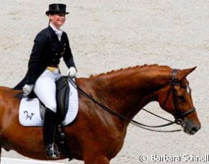 Isabell Werth is not even able to do her Special. She had to flee inside and ride again half an hour later. Warum Nicht couldn't keep his nerves and puts down a mediocre Special, but Werth takes it with good grace and smiles at the crowds.