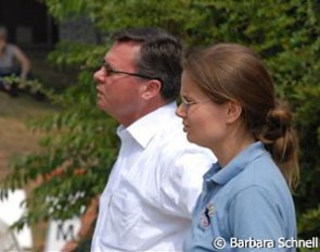 Chef d'Equipe Holger Schmezer watching all the rides. Nadine Capellmann's groom Sabine Domhöver joins him here.