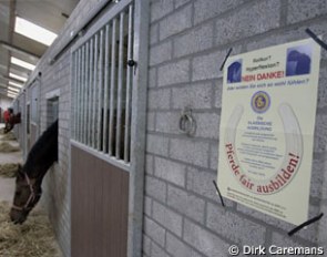 A barn where rollkur is not done. The banner says "Fair Training of Horses" :: Photo © Dirk Caremans