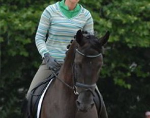 Nadine Capellmann and her new young Hanoverian mare. Capellmann wanted to test this 5-year-old black mare by Waterworld in show surroundings. A very interesting newcomer who has everything -- nerve and movements --except a name.