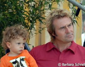 Yannick Janssen van Grunsven and his father Sjef Janssen watching mommy compete.
