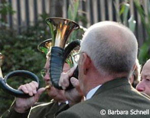 Horn blowers welcome the new champion