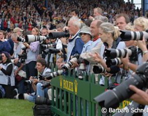 The hardest working people at the show under the worst conditions! Stuffed like sardines in a small box they can not leave under any circumstances! Pity the photographers who do all this for you!