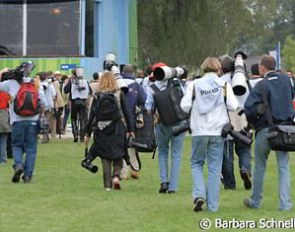 No, the day is not finished yet! Off they go to the press center to download and organize thousands of photos to meet deadlines.
