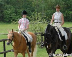 Carlotta Hassenburger on Dulcia and Lydia Camp on Jackpot head towards the warm up ring