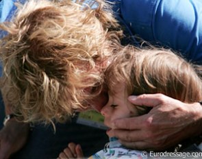 Sjef Janssen cuddling with his son Yannick Janssen van Grunsven