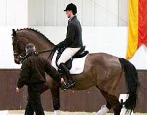 Ferdi helps Michael Eilberg school the piaffe on Marakov :: Photo © Caroline Finch