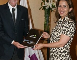 Paillot presenting Princess Haya the candidacy Book outlining the bid of Lower Normandy, Northern France, to host the 2014 World Equestrian Games.