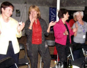 Cara Whitham and attendees dancing to Dancing Queen