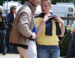 Isabell Werth watching a test with Heiner Schiergen