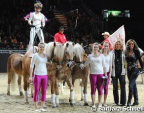 A local riding club participating in the "Show Cup" at the 2009 Equitana Fair
