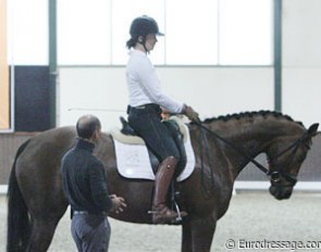 Steffen Peters teaches a young girl on a 5-year old Jazz x Rubinstein mare