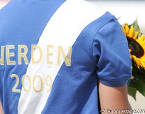 The flower girls wear a nice polo during the award ceremony