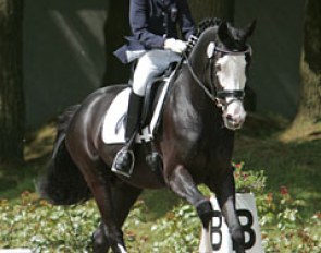The petite Fabienne Claeys has a great schoolmaster in Domino