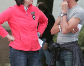 Dutch pony chef d'equipe Christa Laarakkers converses with Tommie Visser