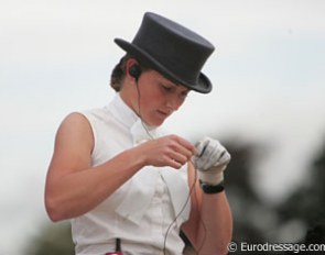 Maria Eilberg fixed her head set.