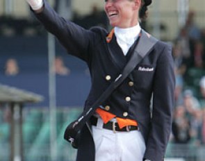 Cornelissen thanks her fans on the podium when she's about to receive her European Grand Prix Special gold medal