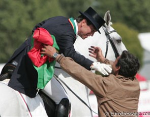 Brothers Carlos and Daniel Pinto give each other a hug after Carlos' ride.