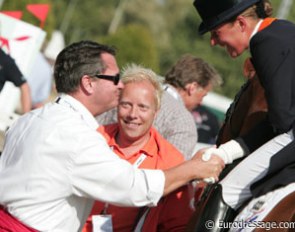 German team trainer Holger Schmezer congratulating gold medallist Adelinde Cornelissen